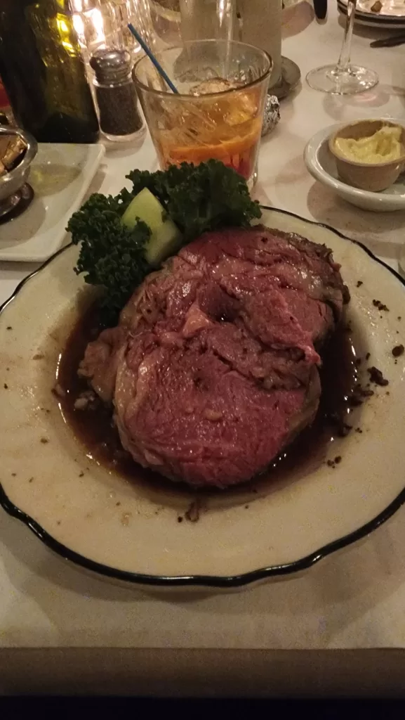 Prime Rib steak with an old fashioned cocktail